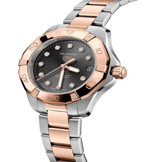 Tag Heuer Aquaracer with rose gold and steel case and bracelet in black dial.