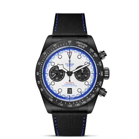 Tudor black bay chrono carbon 2025 watch with black strap and blue accents on a white background with carbon fiber case in 42mm dial size.